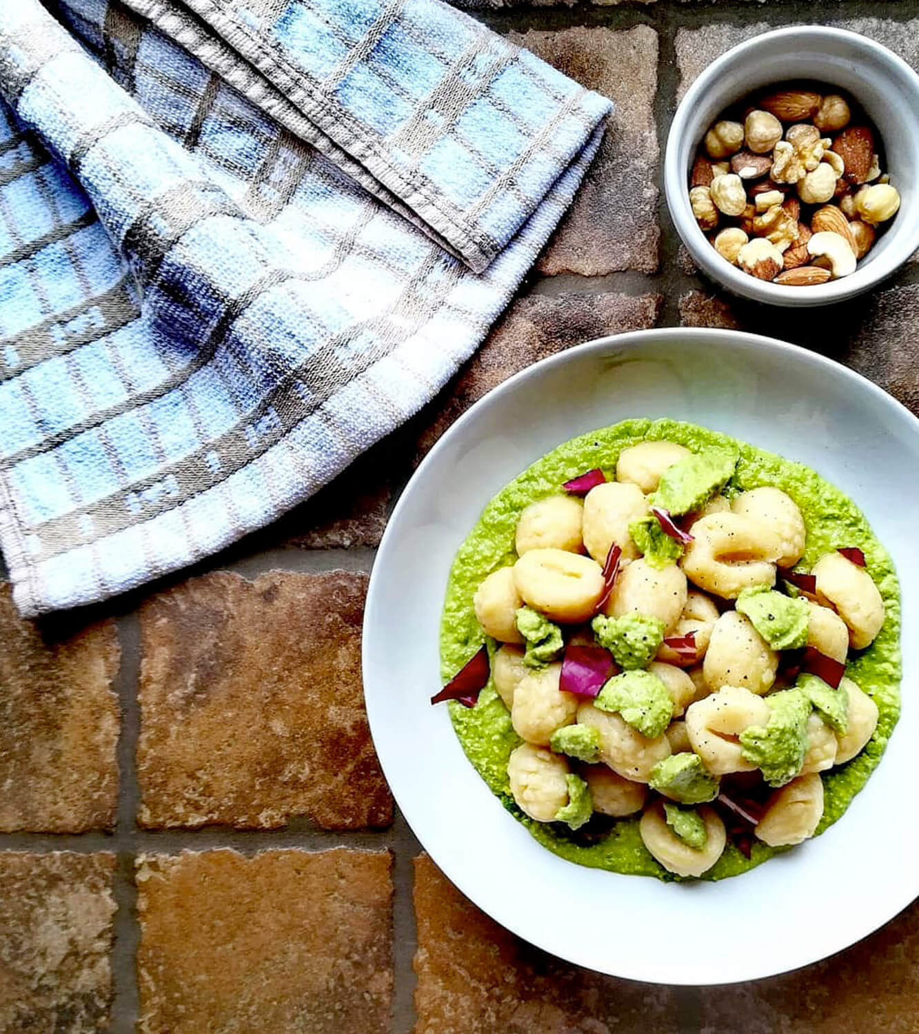 Gnocchi with peas pesto and radicchio