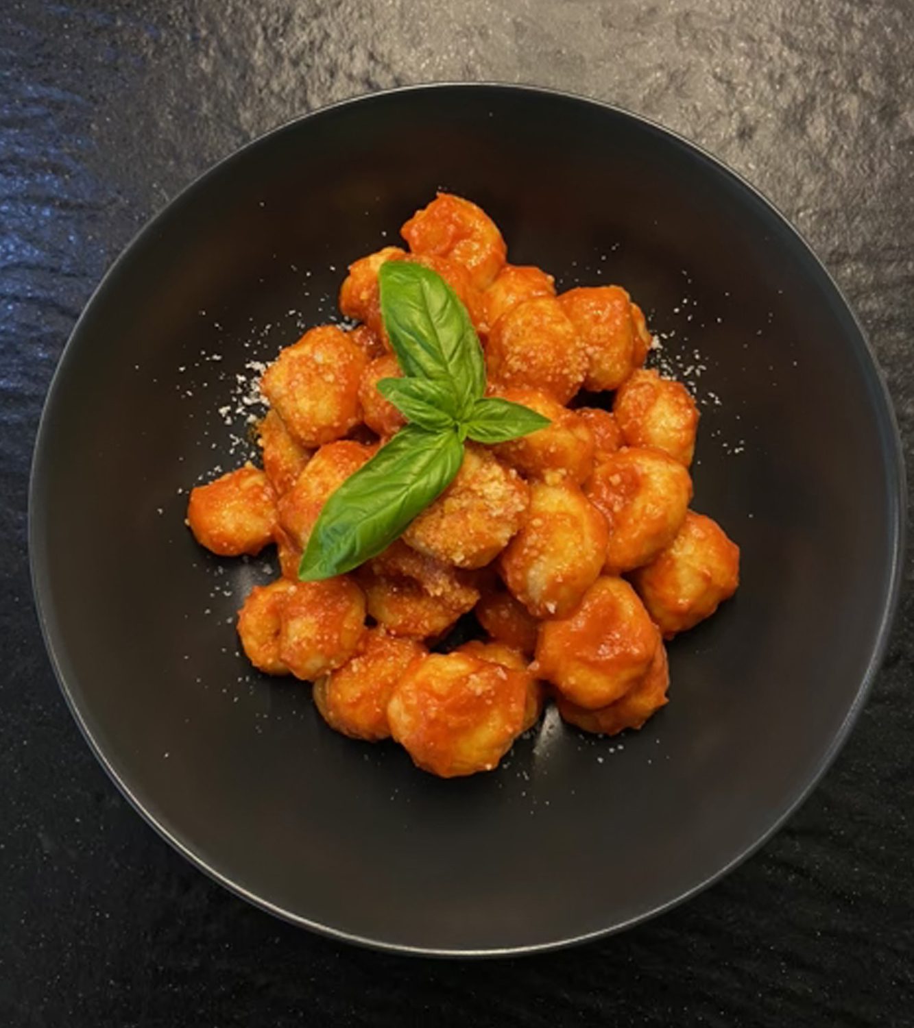 Gnocchi de papas con salsa de tomate