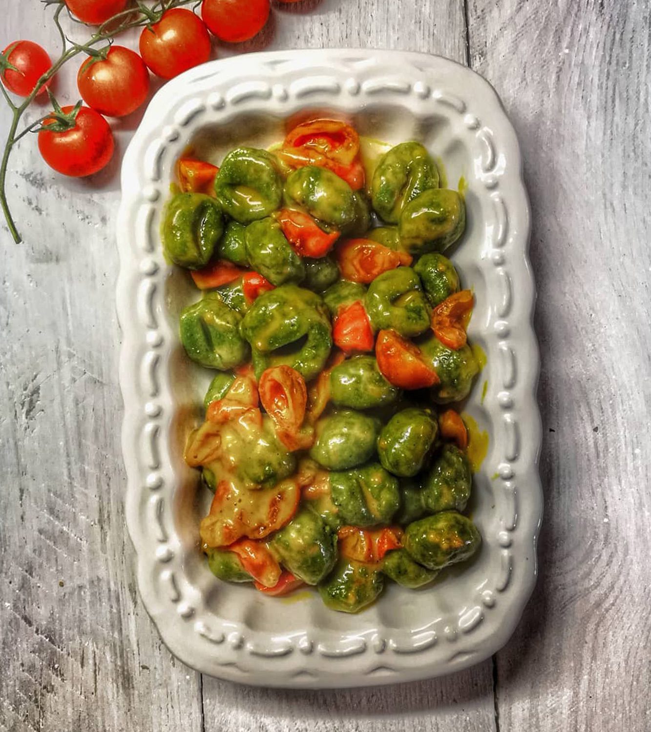 Potato gnocchi with Taleggio cheese and cherry tomatoes